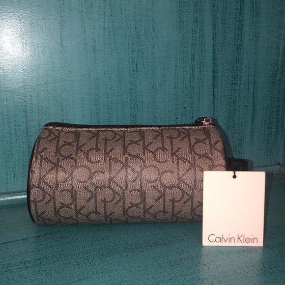 Calvin Klein Handbags - NWT Calvin Klein round makeup bag